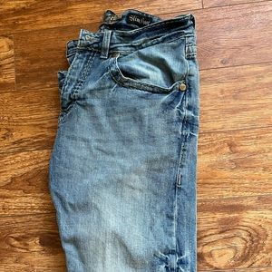 Wrangler Rock 47 denim slim boot jeans.